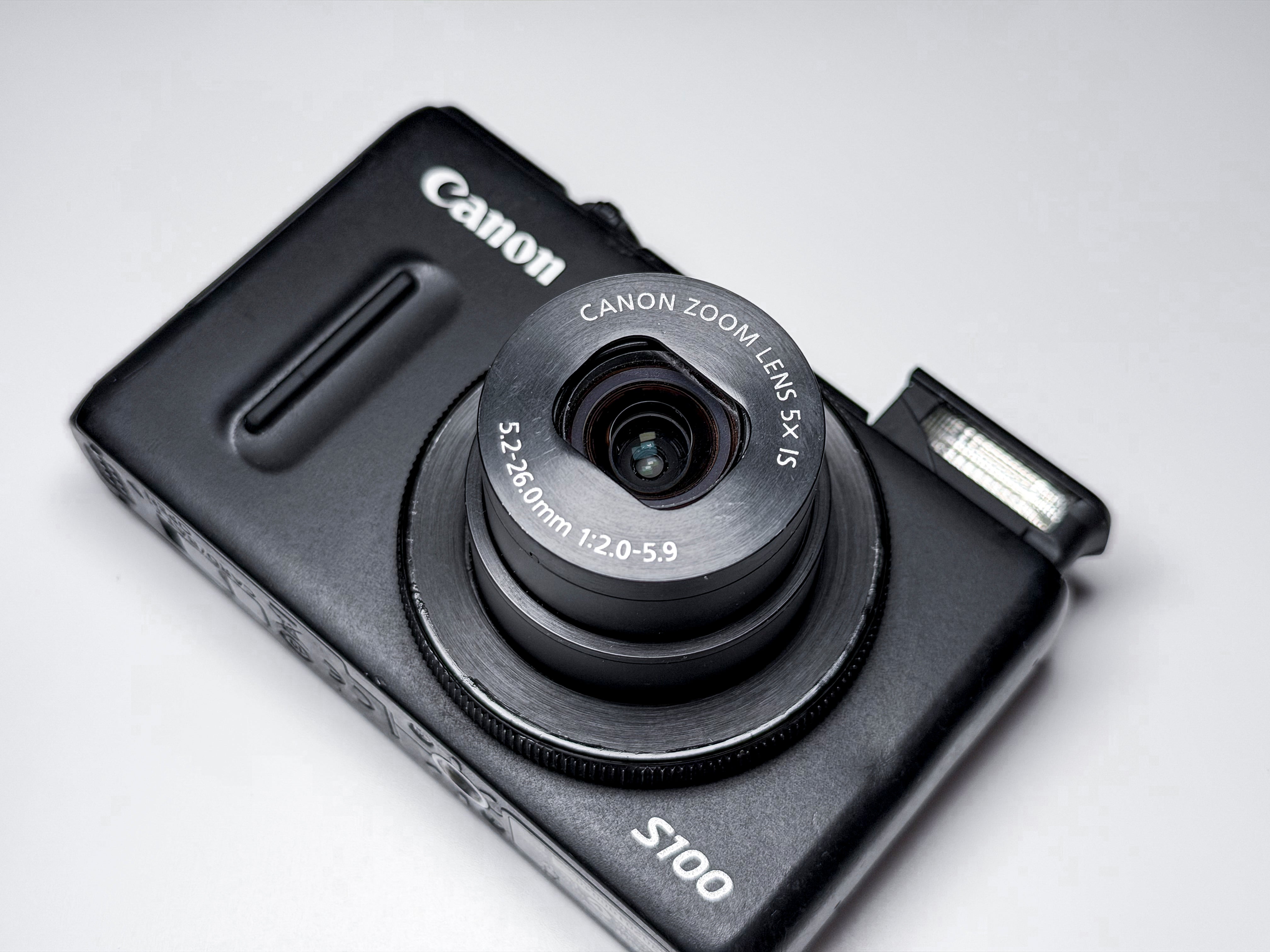 Canon S100 Powershot Digital Camera 5X Zoom IS f/2 - 1 Year Warranty, Excellent