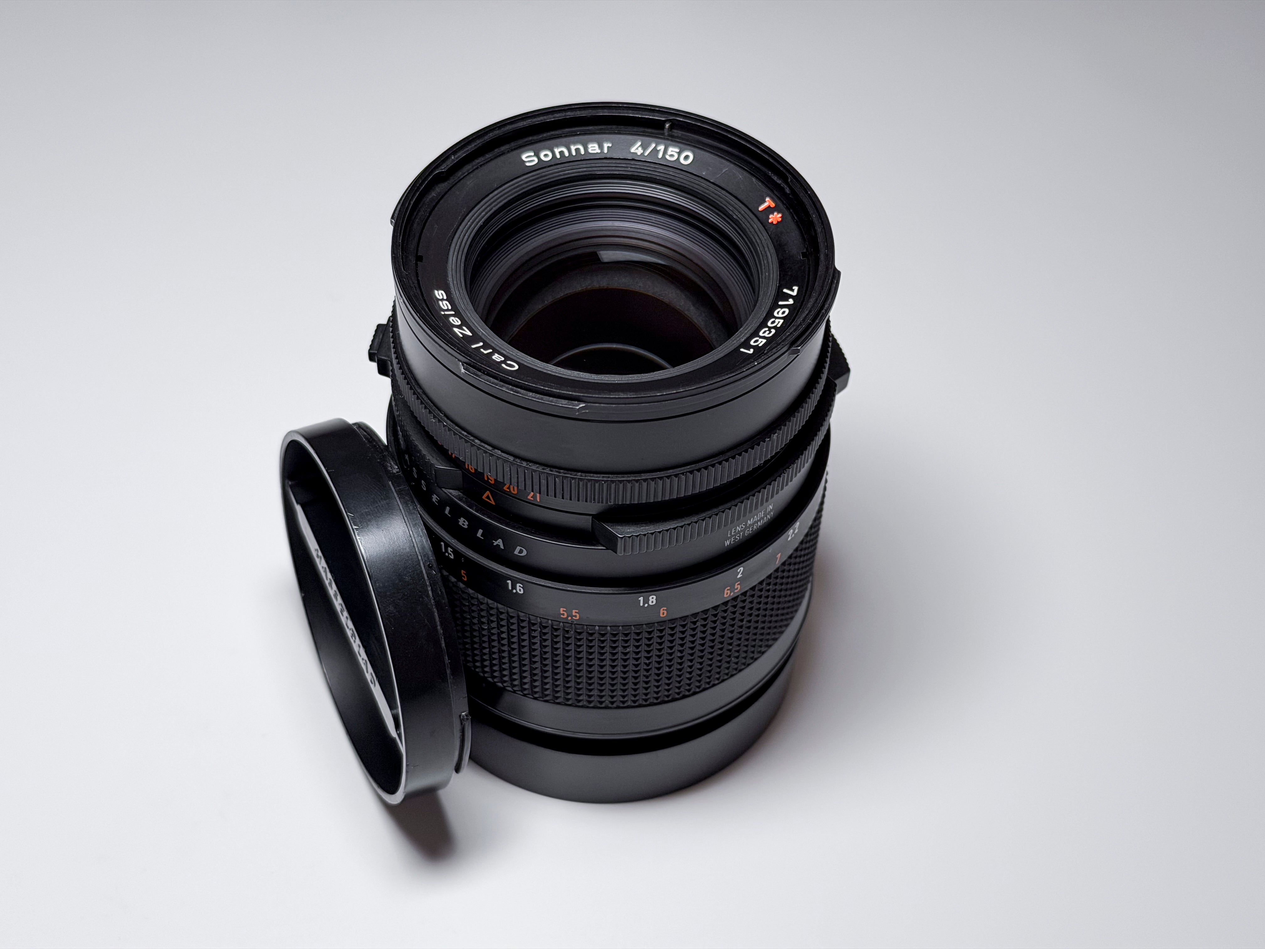 Hasselblad 150mm f/4 Sonnar T* CF Lens + Hood and Caps - Excellent, Near Mint
