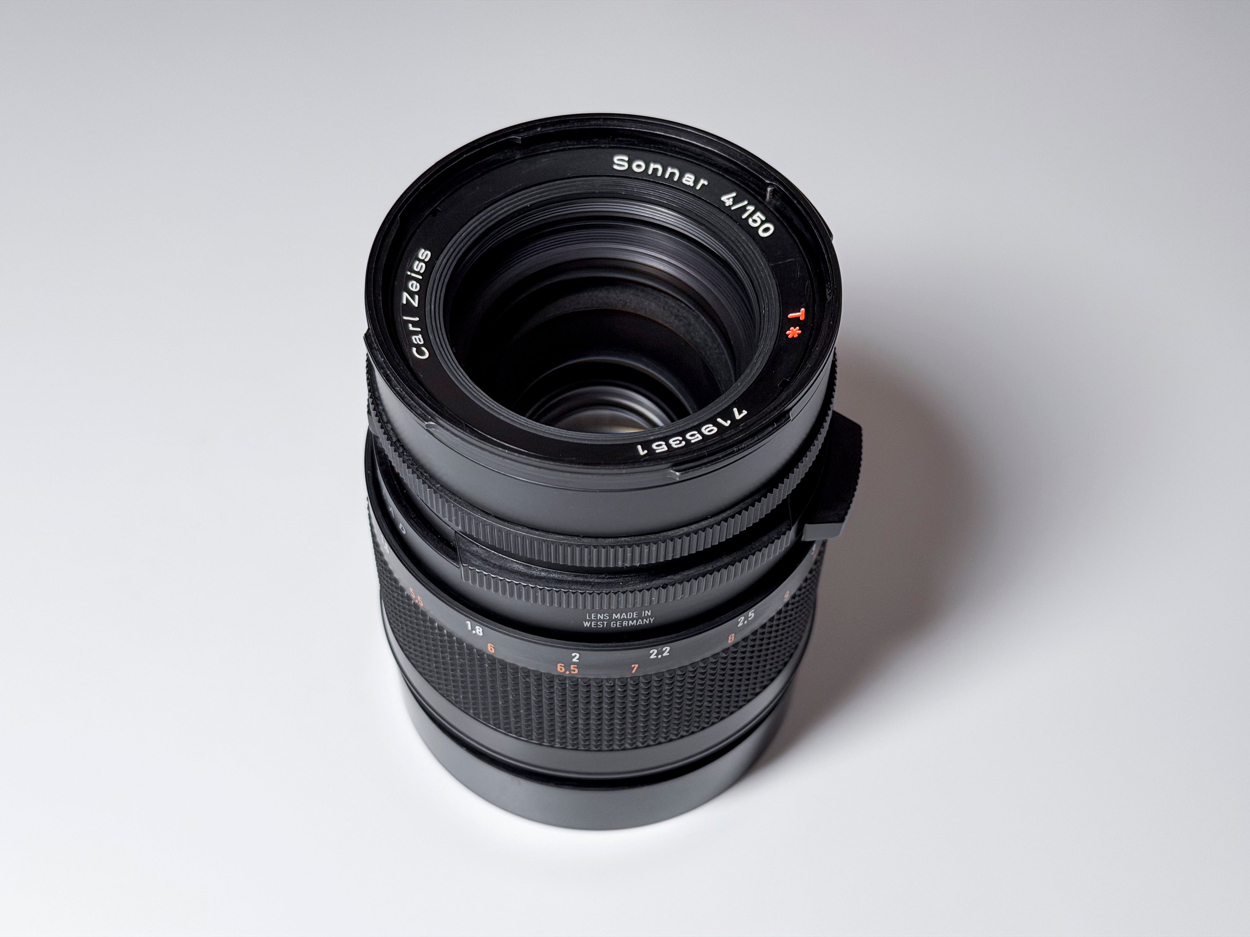 Hasselblad 150mm f/4 Sonnar T* CF Lens + Hood and Caps - Excellent, Near Mint