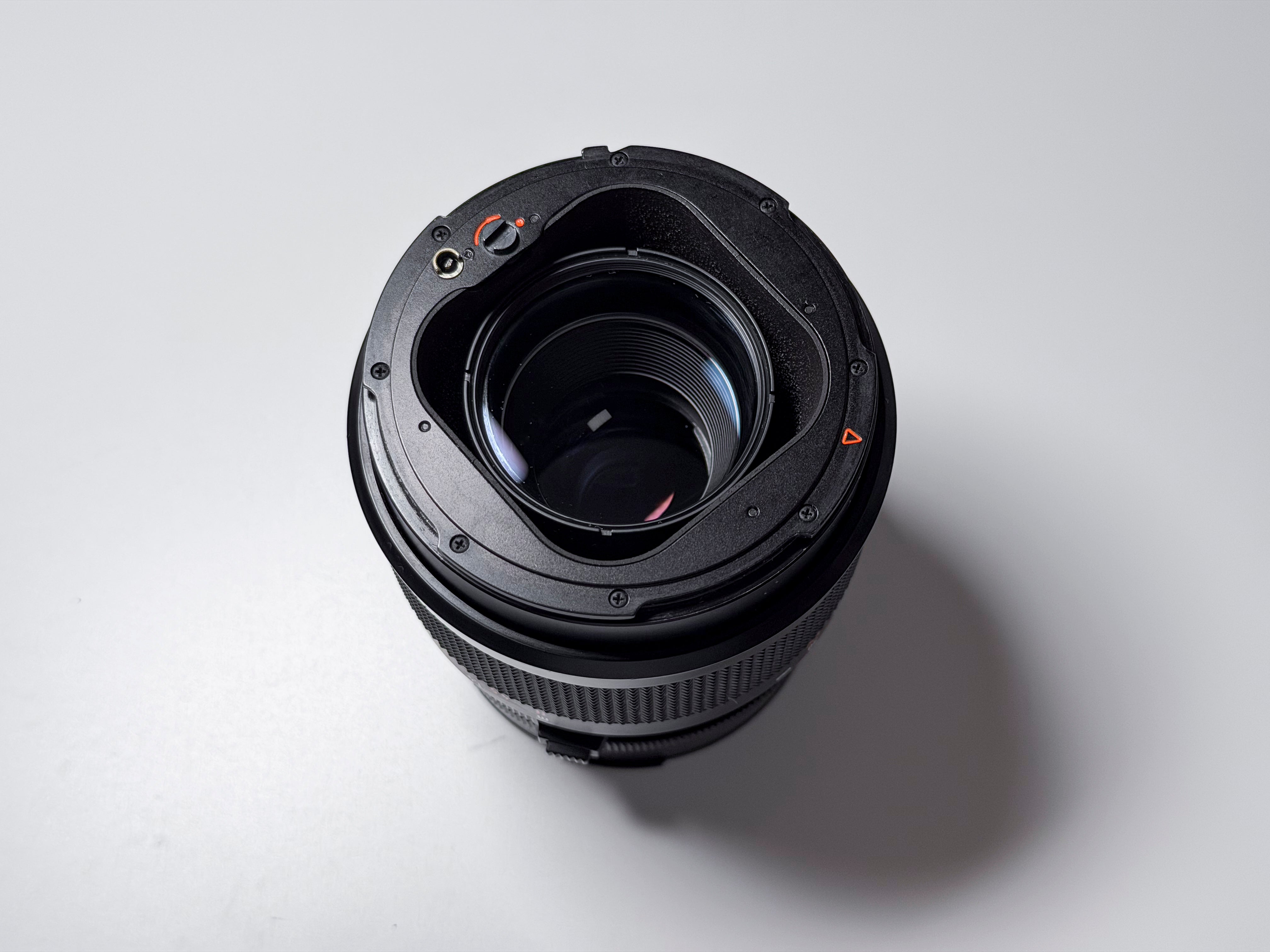 Hasselblad 150mm f/4 Sonnar T* CF Lens + Hood and Caps - Excellent, Near Mint