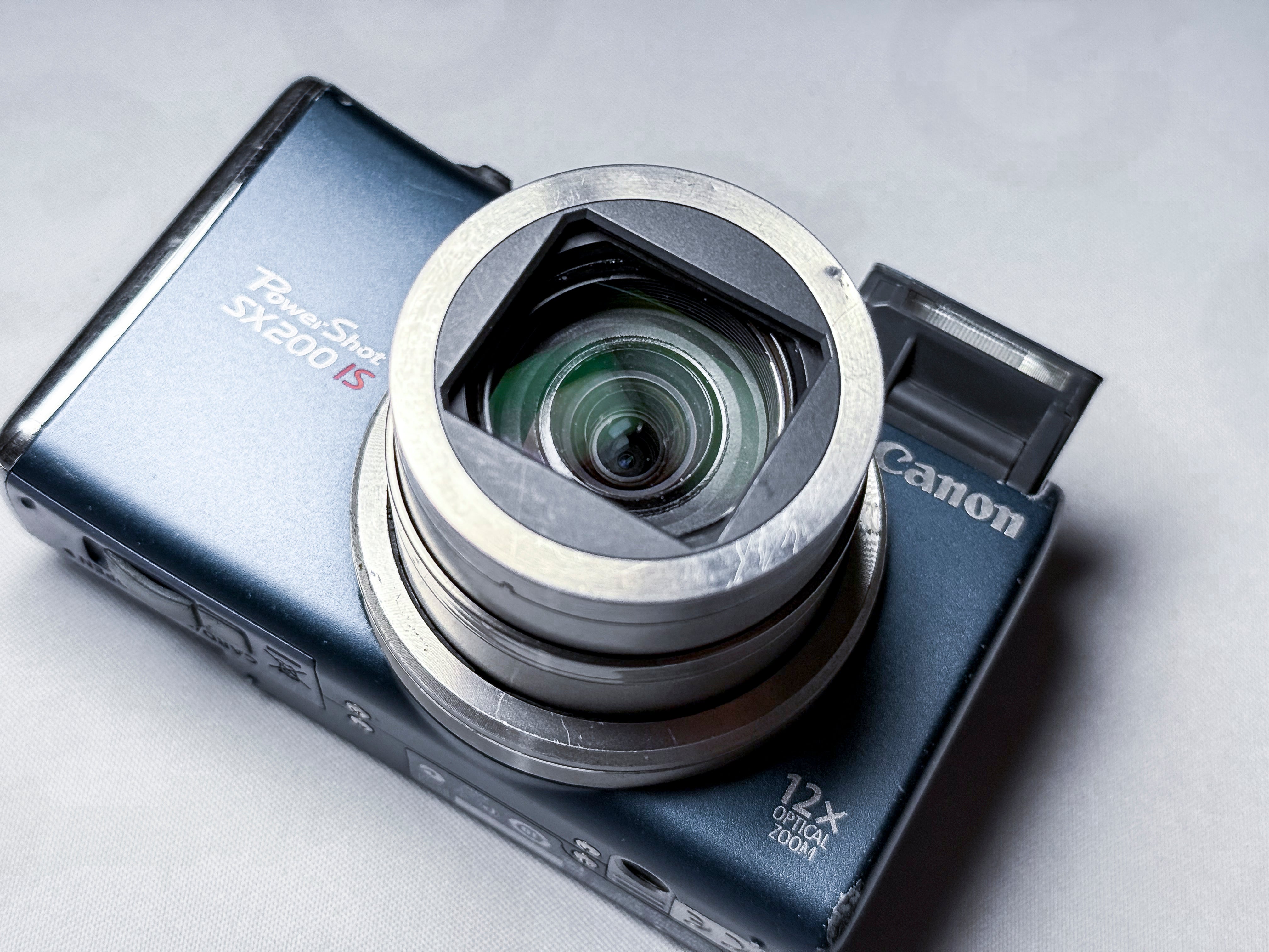 Canon SX200 IS CCD 12x Zoom - 1 Year Warranty, Perfectly Working