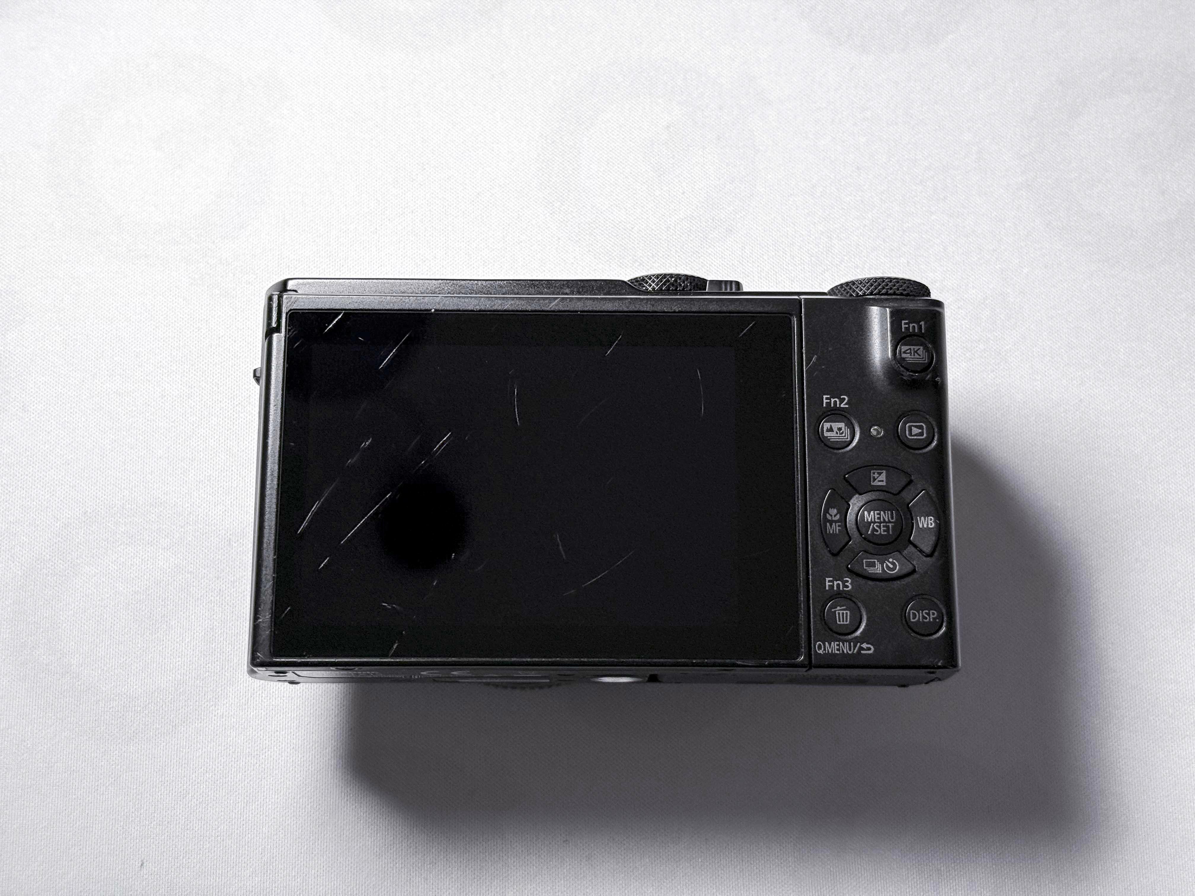 Panasonic Lumix LX15 - LX10 with Leica Summilux - Warranty, spots on the sensor