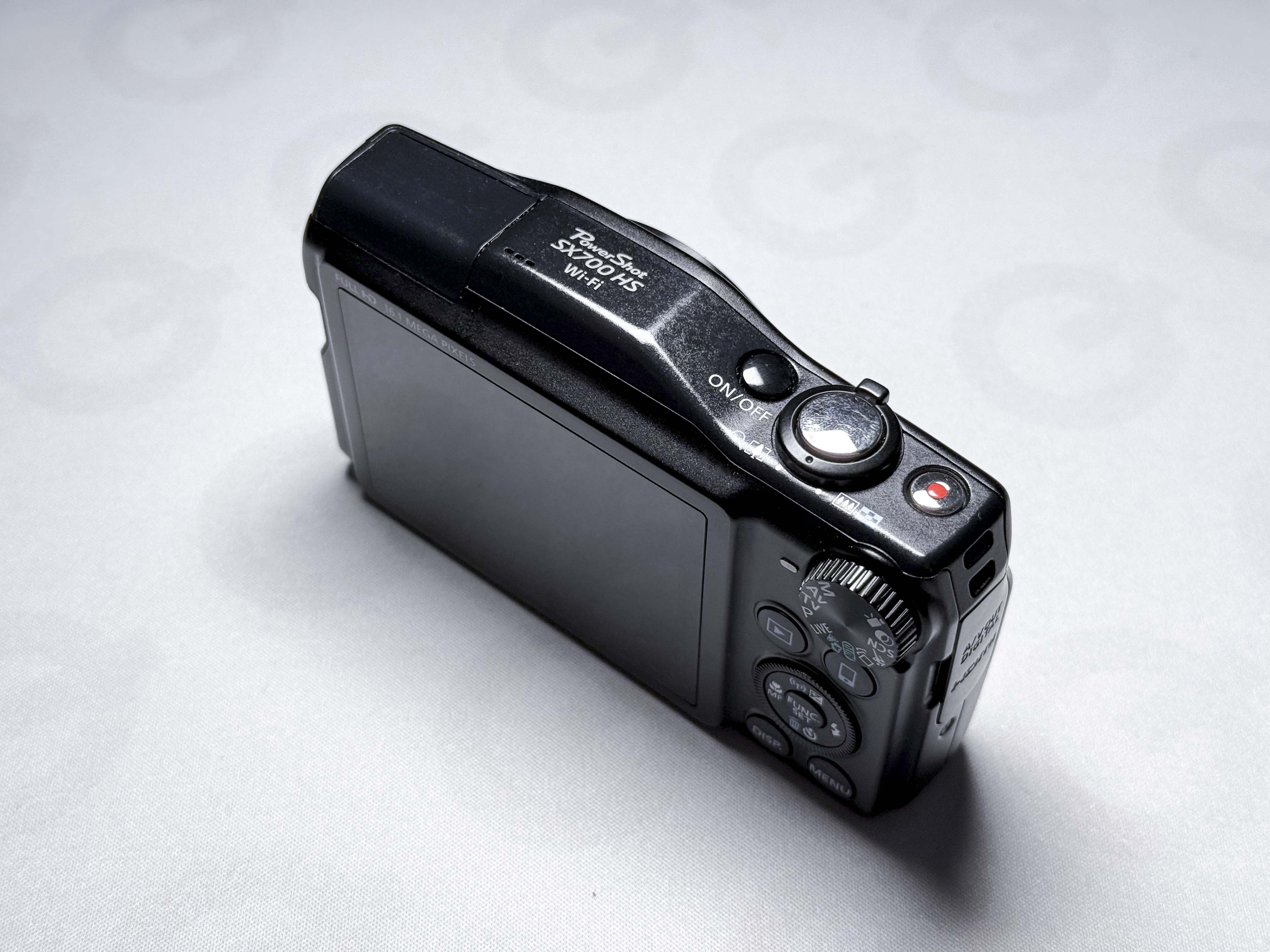 Fotocamera compatta Canon SX700 HS con zoom 30x - Garanzia di 1 anno, eccellente