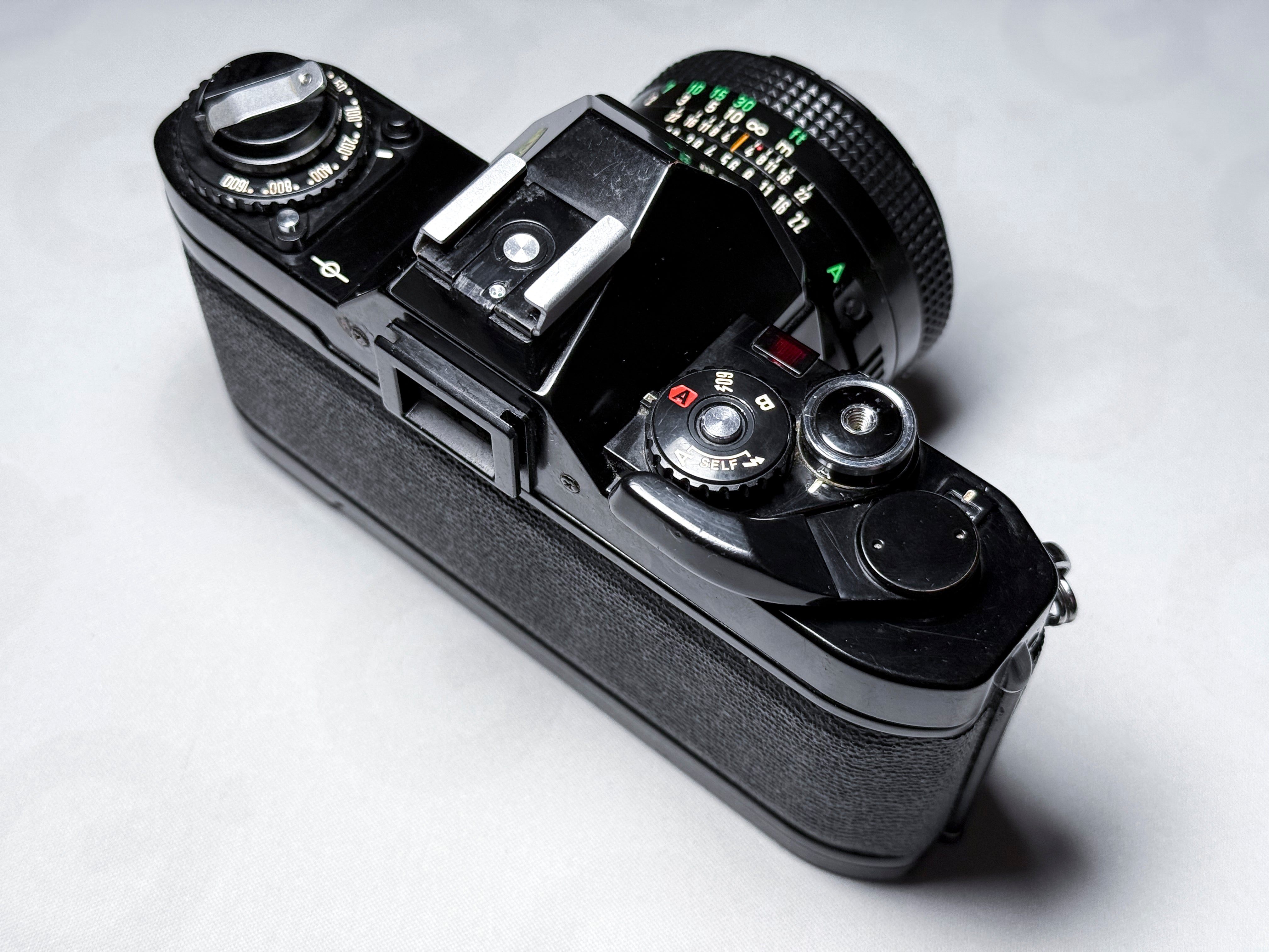 Canon AV-1 + 50mm f/1.8 FD 35mm Film Reflex - Funzionante, buone condizioni AV1