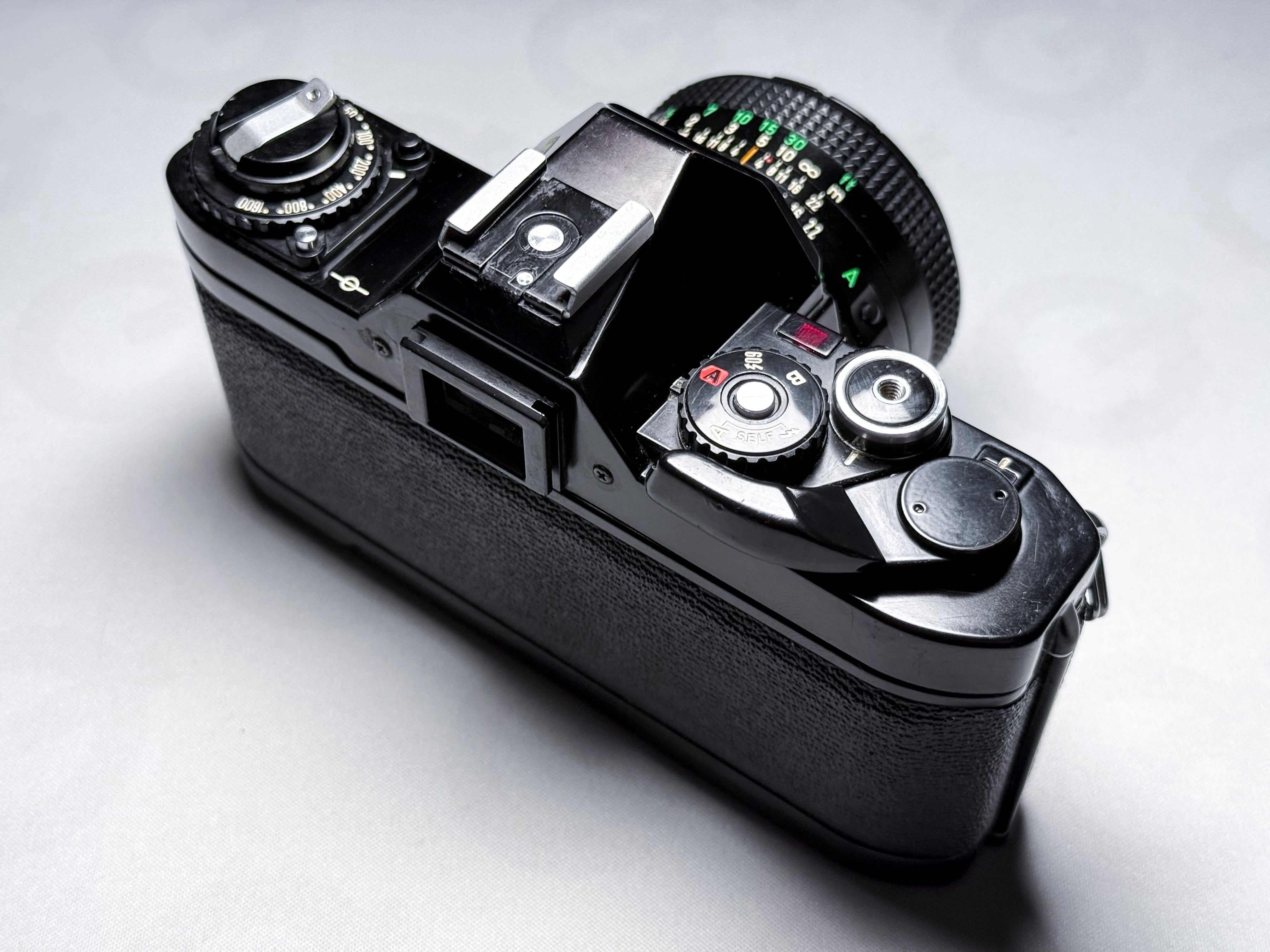 Canon AV-1 + 50mm f/1.8 FD 35mm Film Reflex - Funzionante, buone condizioni AV1