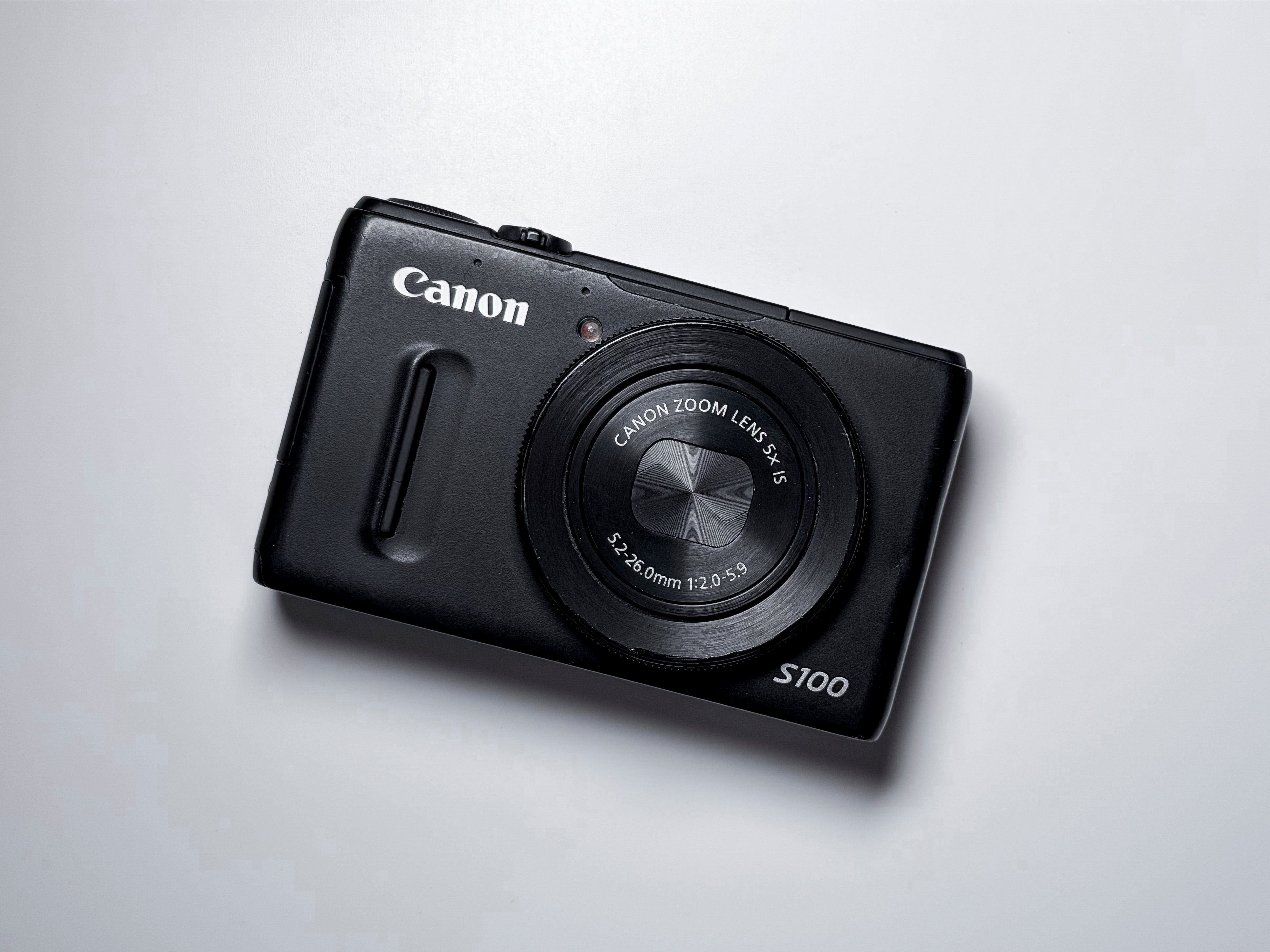 Canon S100 Powershot Digital Camera 5X Zoom IS f/2 - 1 Year Warranty, Excellent
