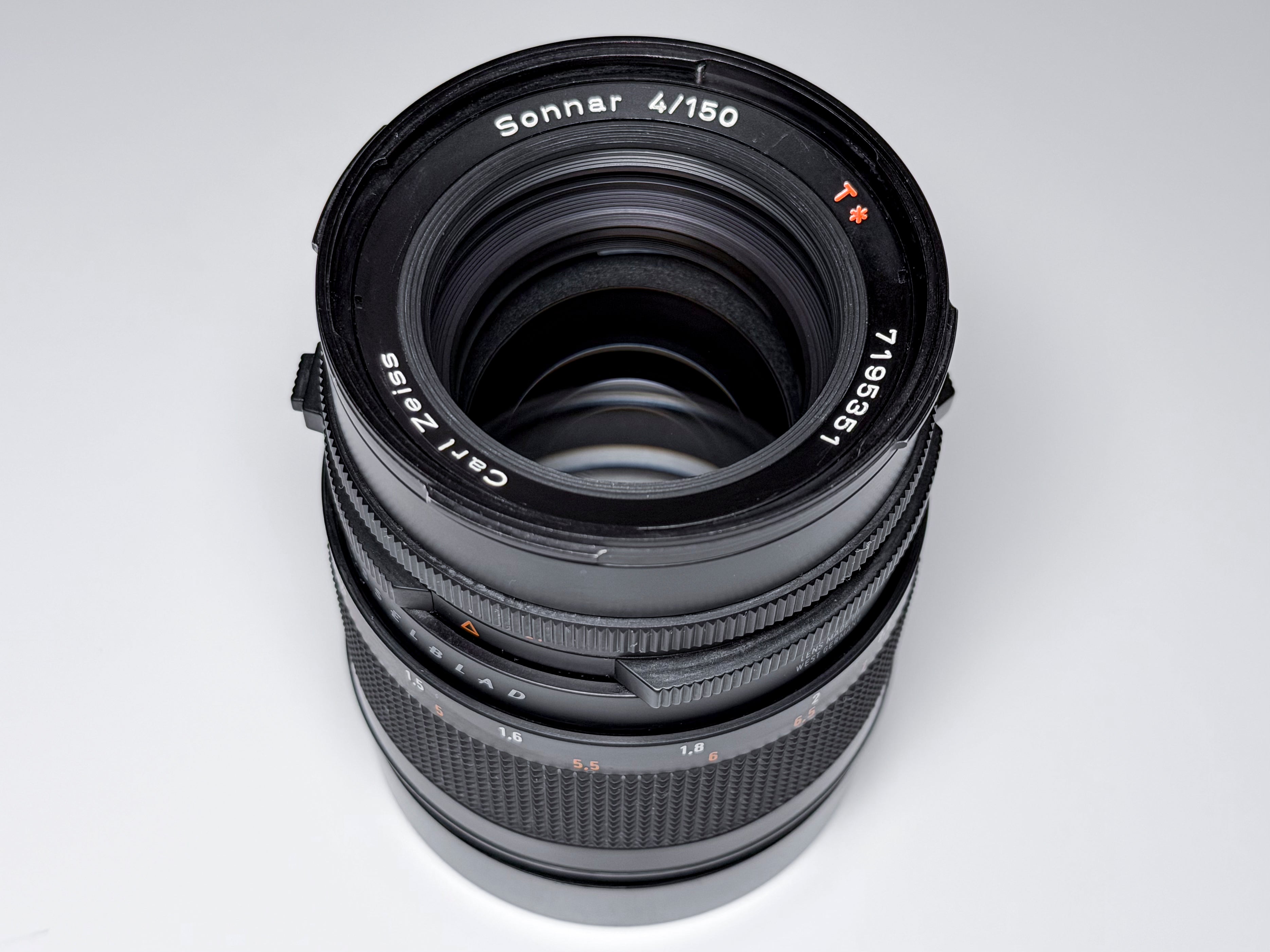 Hasselblad 150mm f/4 Sonnar T* CF Lens + Hood and Caps - Excellent, Near Mint