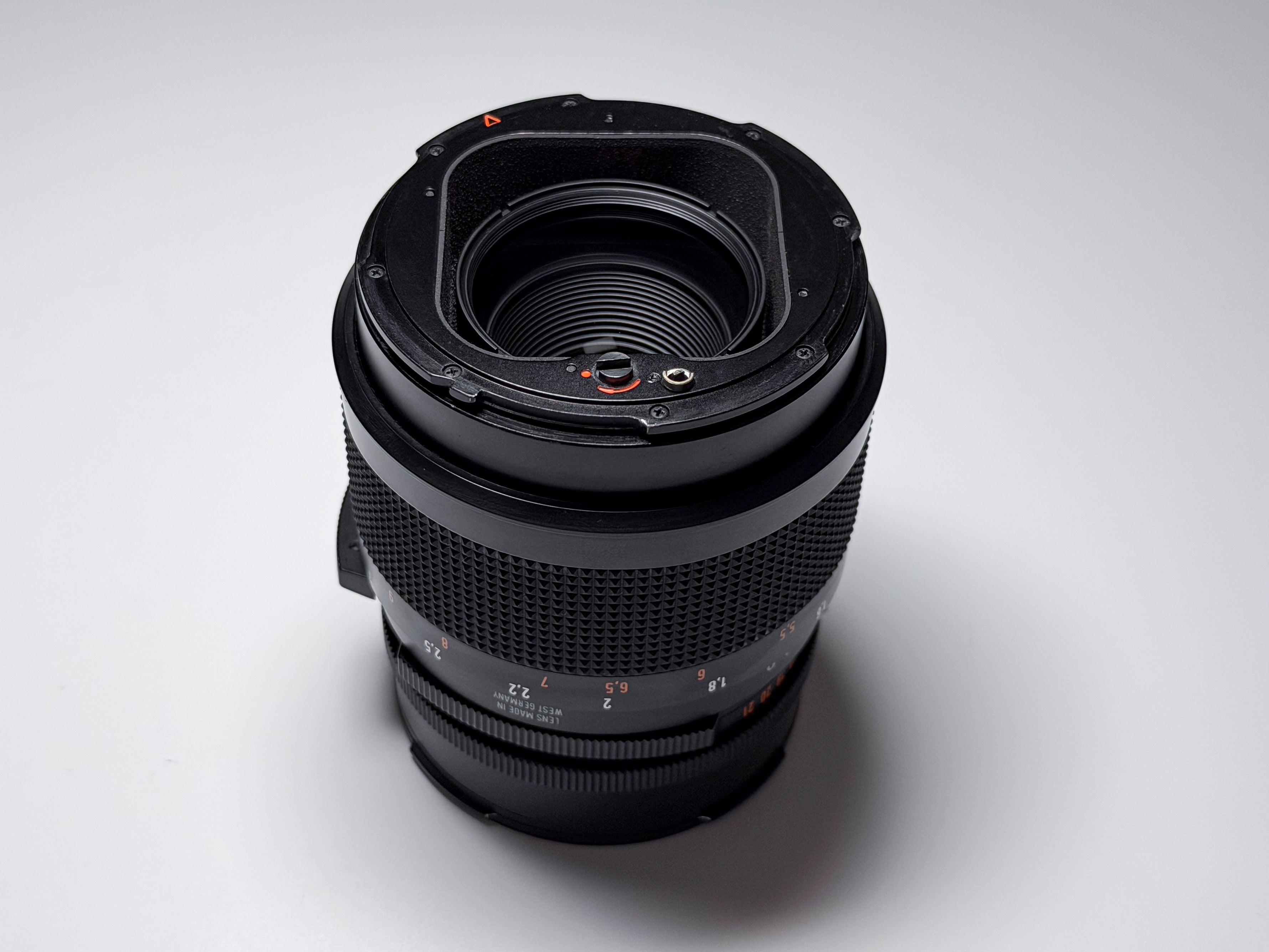 Hasselblad 150mm f/4 Sonnar T* CF Lens + Hood and Caps - Excellent, Near Mint